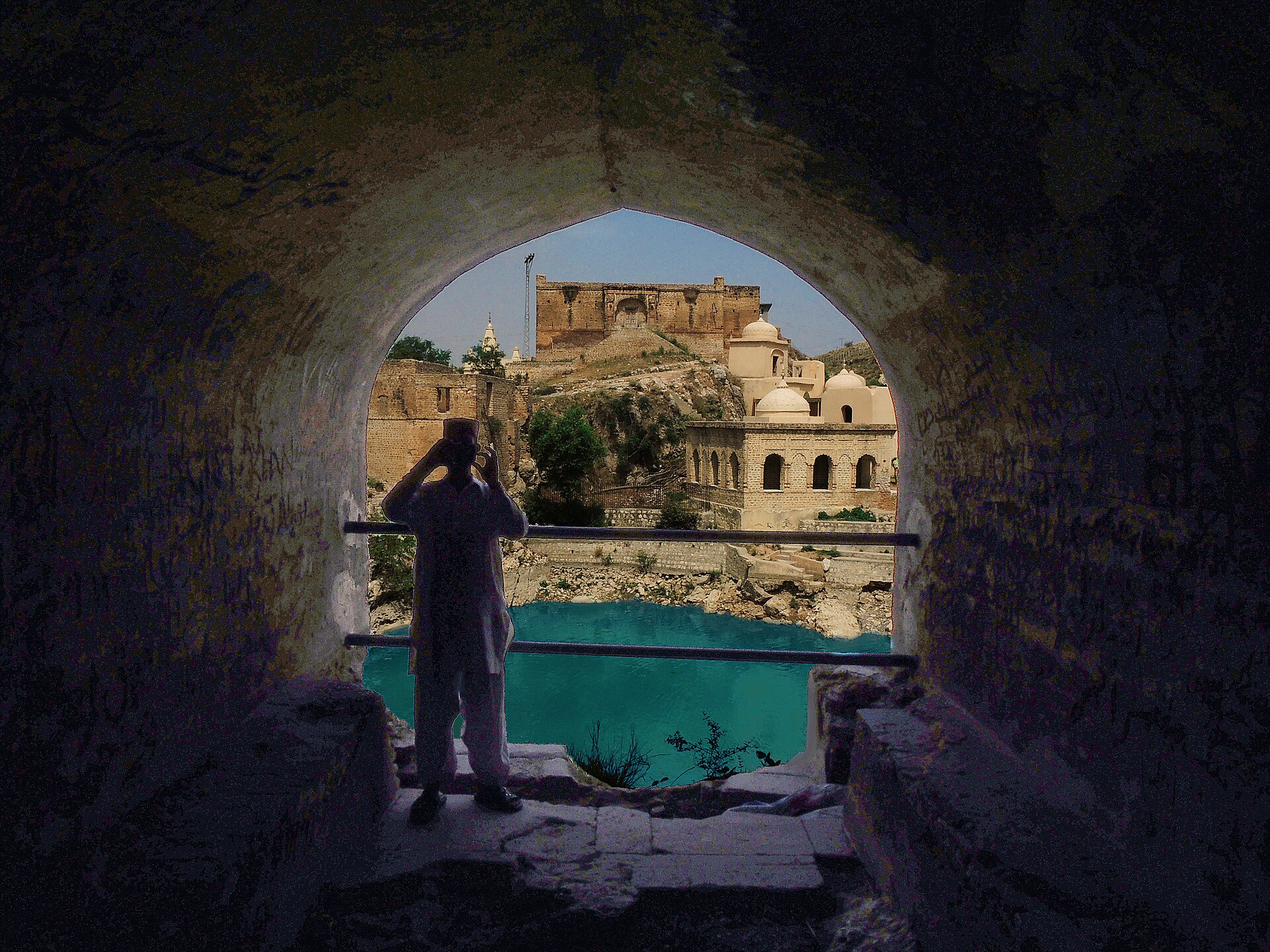 The Katas pond seen through a tunnel
