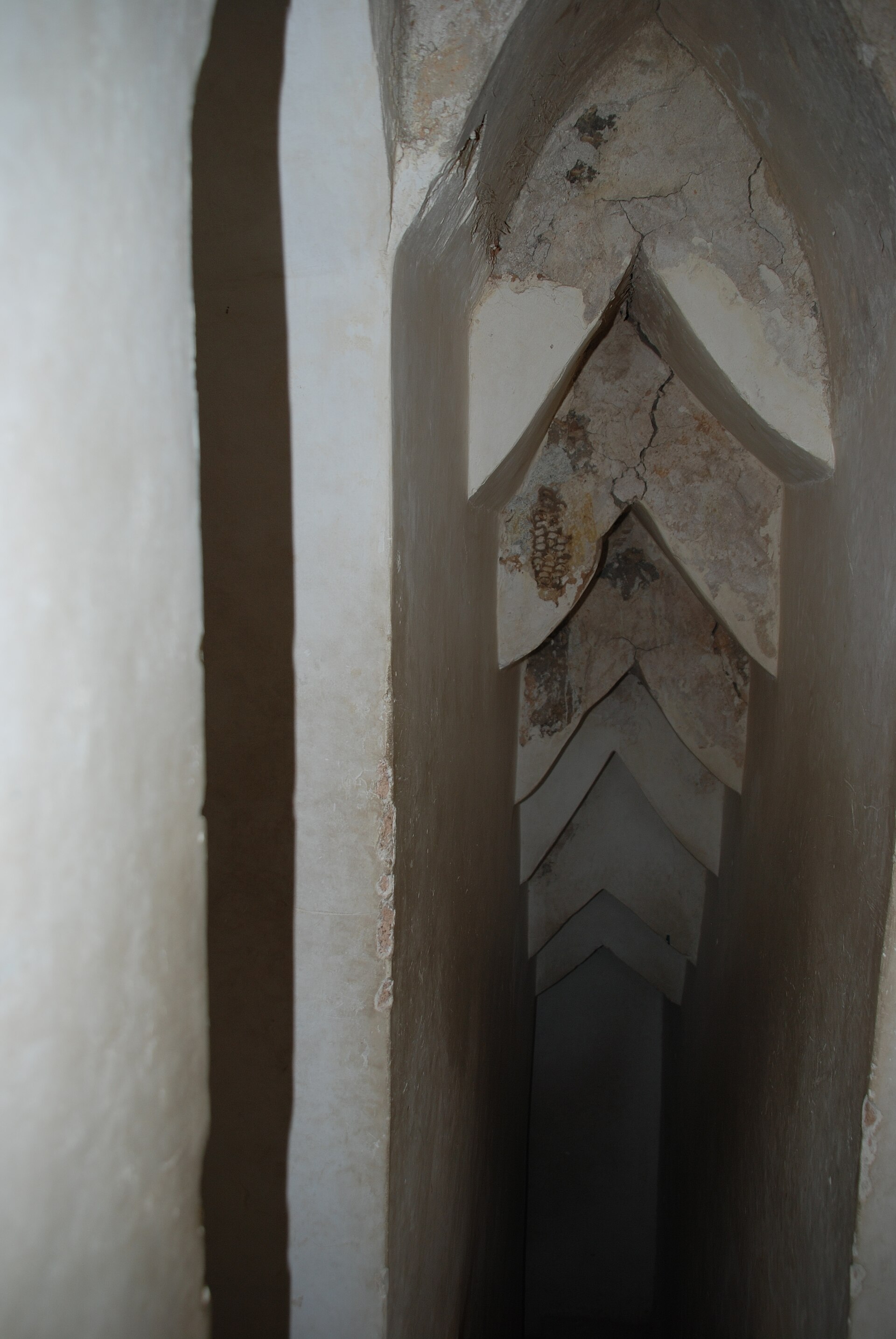 Narrow staircase inside the Satghara temple